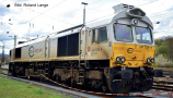 [Lokomotivy] &rarr;&nbsp;[Ostatn�]&nbsp;&rarr;&nbsp;[Ostrovn�]&nbsp;&rarr;&nbsp;HN9080HM: dieselov� lokomotiva �ed�-oran�ov�-�ed�, �ern� r�m a pojezd „Euro Cargo Rail“
